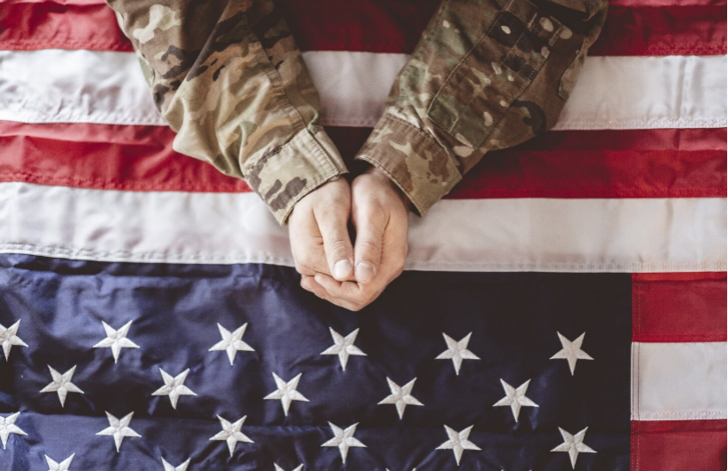 American soldier with an American flag