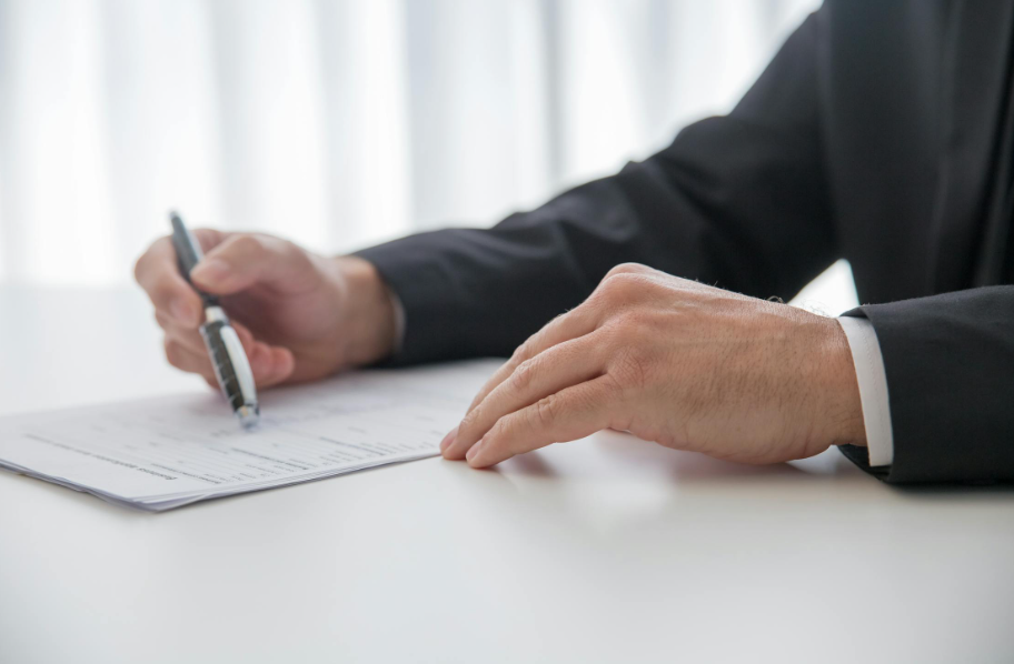 A Medicare insurance agent in Georgia reviewing an insurance policy.